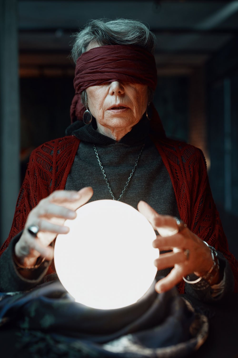 blindfolded-witch-fortune-teller-doing-predictions-2023-02-15-01-33-14-utc.jpg